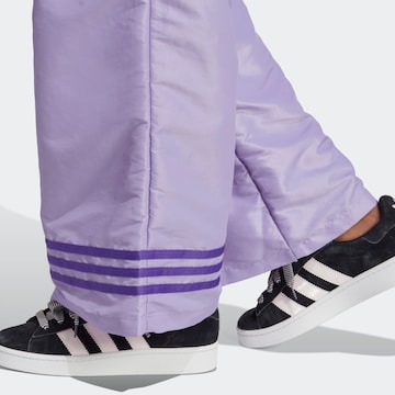 ADIDAS ORIGINALS Szeroka nogawka Spodnie w kolorze fioletowy