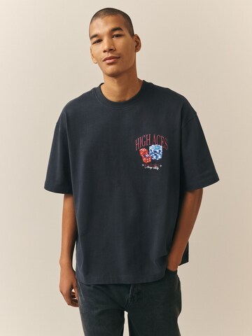 Next T-Shirt in Schwarz: Vorderseite