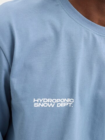 hydroponic - Camiseta 'Hydroponic x Peanuts Regular-Fit Long-Sleeve Ski Lift T-Shirt' en azul