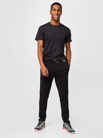 ADIDAS SPORTSWEAR Tapered Παντελόνι φόρμας 'Essentials Brandlove Fleece' σε μαύρο