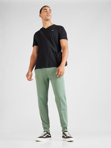 GAP Zwężany krój Spodnie w kolorze zielony