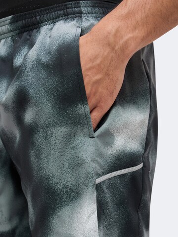 NIKE Regular Sportbroek 'Miler' in Zwart