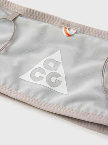 NIKE Accessoires Sportstirnband in Grau