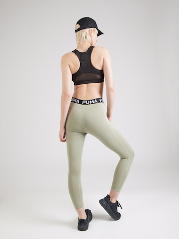 PUMA Skinny Fit Спортен панталон 'Strong' в зелено