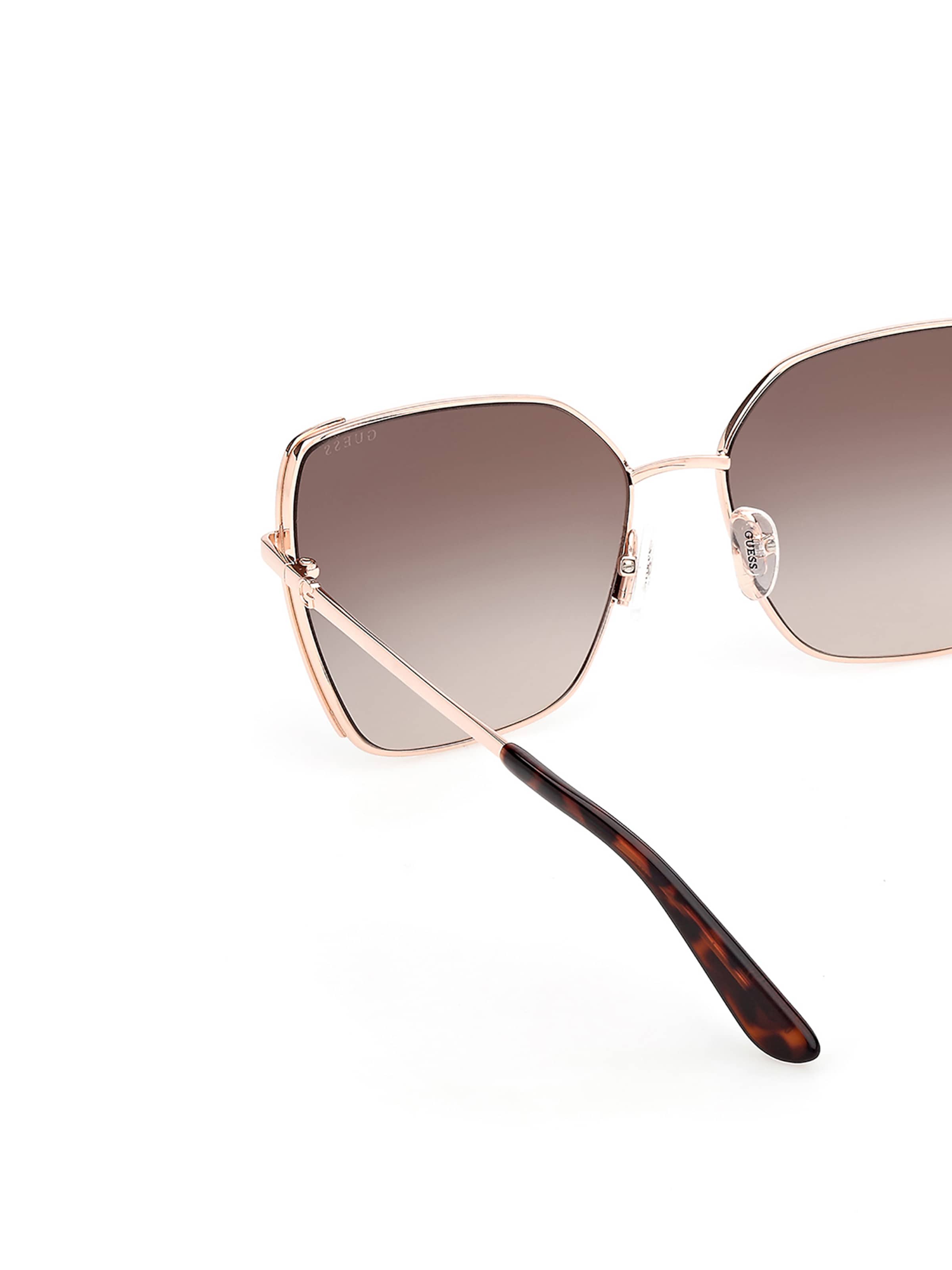 GUESS Sunglasses in Gold