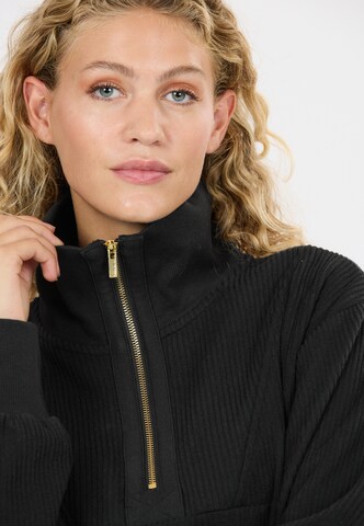 Athlecia Sportief sweatshirt 'Reiley' in Zwart
