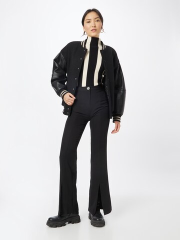 Trendyol Flared Pants in Black