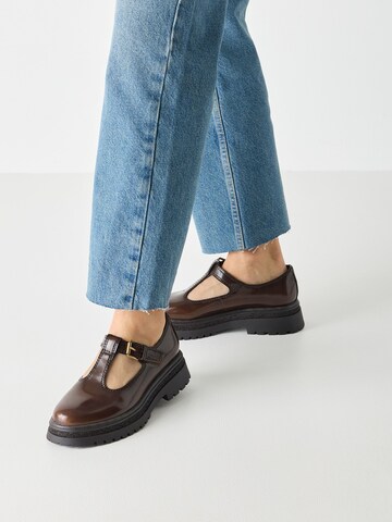 Tamaris Slip-ons in Brown