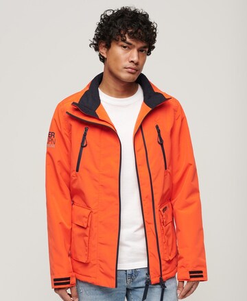 Veste mi-saison Superdry en orange : devant