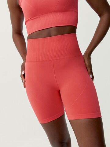 Skinny Pantalon de sport 'Dana' Born Living Yoga en orange : devant