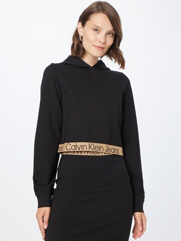 Sweat-shirt Calvin Klein Jeans en noir : devant