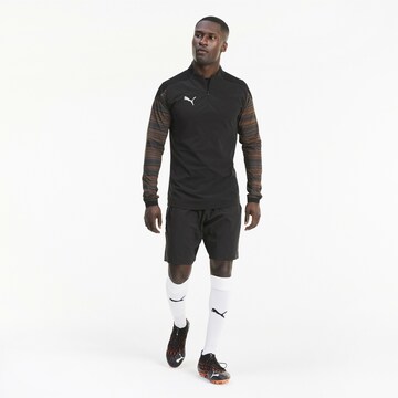 PUMA Funktionsshirt in Schwarz