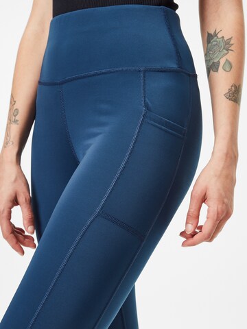 Hummel Skinny Športne hlače 'Tola' | modra barva