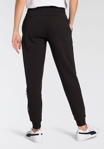 PUMA Regular Sports trousers 'ESS+' in Black