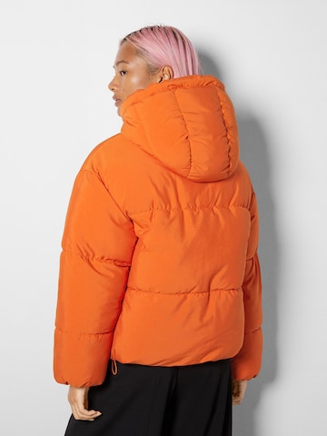 Bershka Winterjas in Oranje