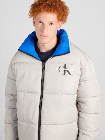 Calvin Klein Jeans Between-season jacket 'Reversible 90s' in Blue