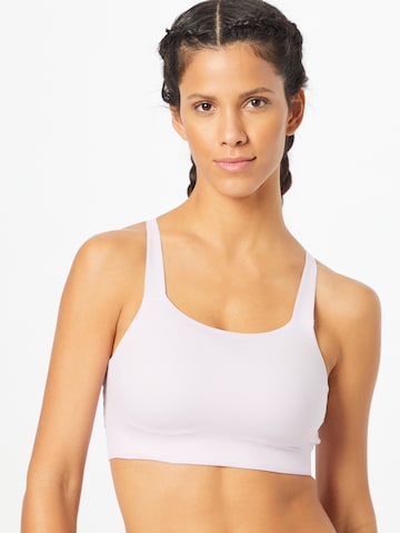 NIKE Regular Sports bra in Pink: front