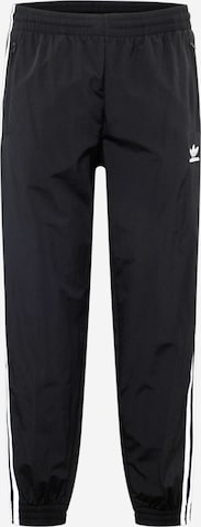 Effilé Pantalon ADIDAS ORIGINALS en noir : devant