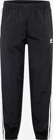 ADIDAS ORIGINALS Tapered Trousers in Black: front