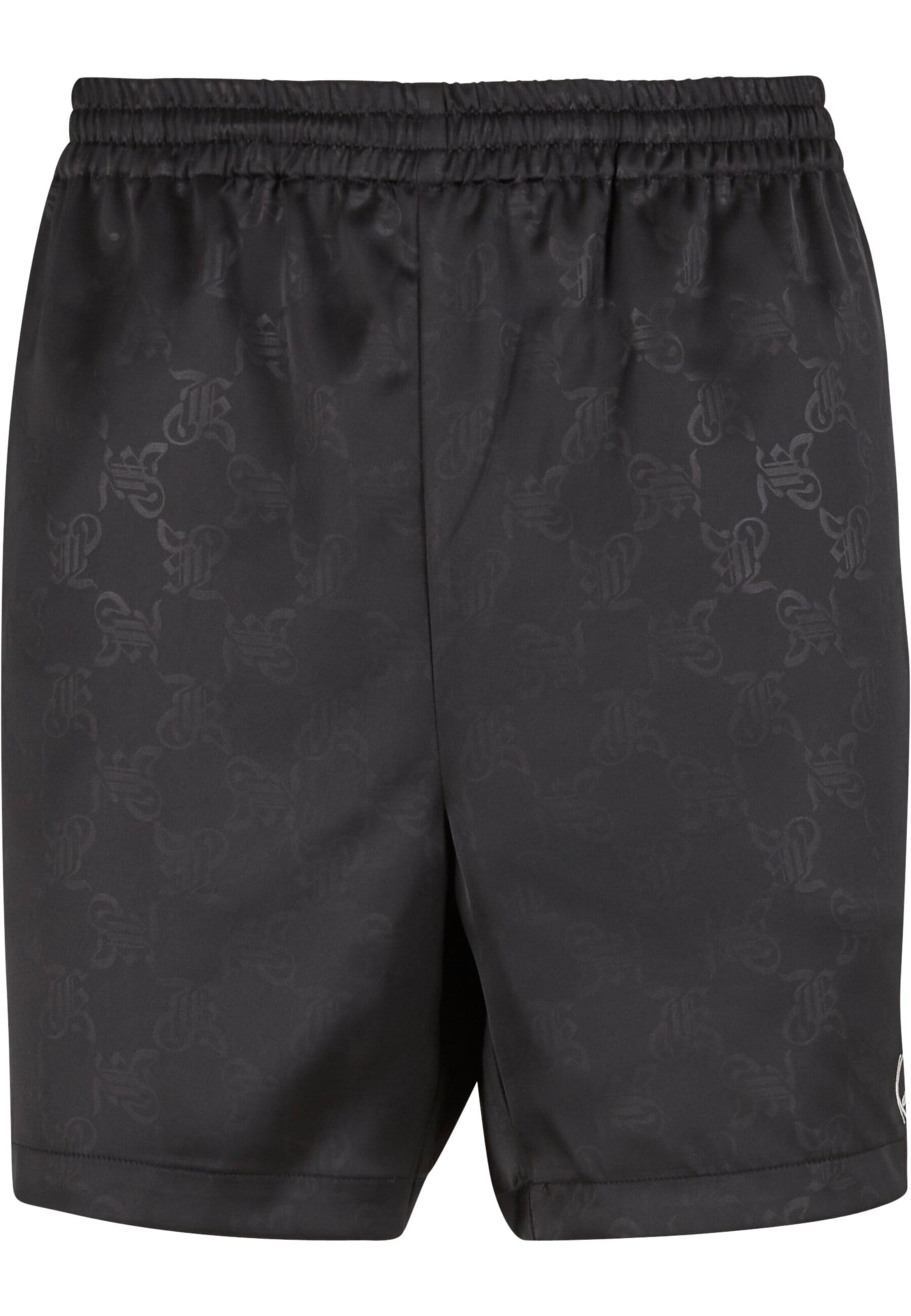 Karl Kani Regular Trousers in Black: front