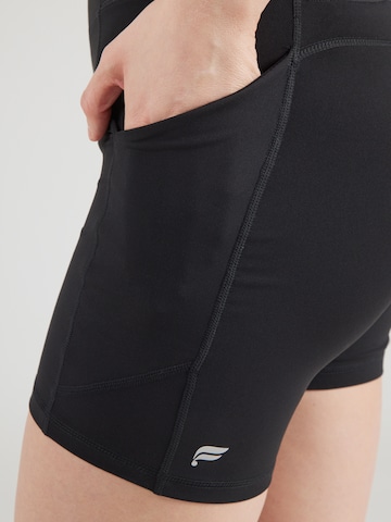 Skinny Pantaloni sport de la Fabletics pe negru