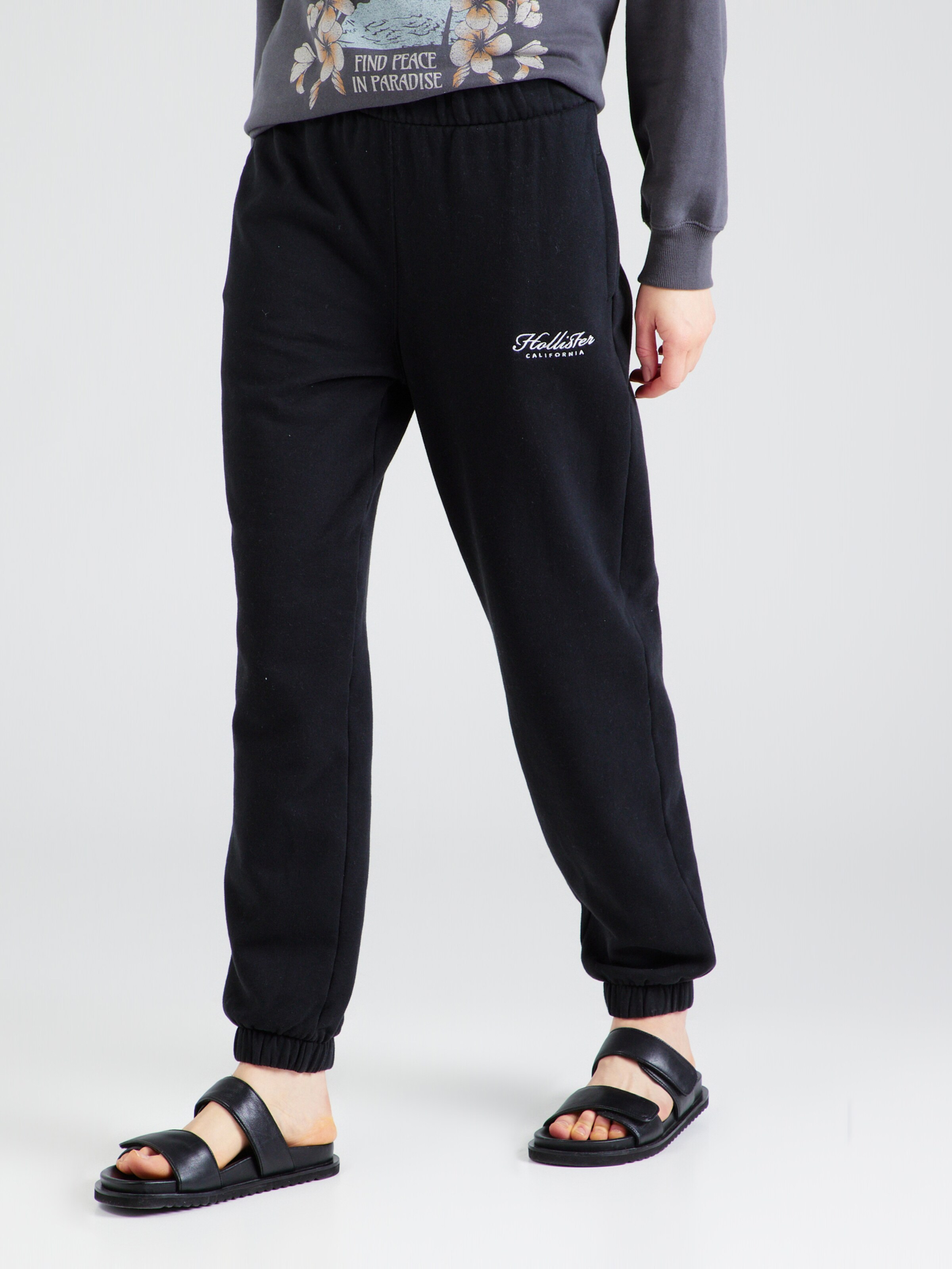 HOLLISTER Tapered Pants in Black ABOUT YOU