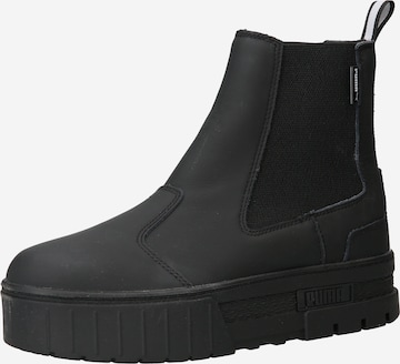 PUMA Chelsea-bootsi värissä musta: edessä