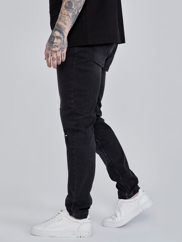 Slimfit Jeans di SikSilk in nero