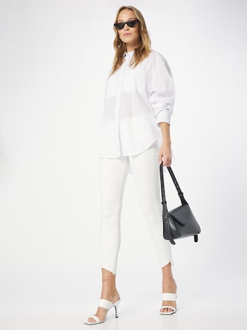 Skinny Jeans di Dawn in bianco