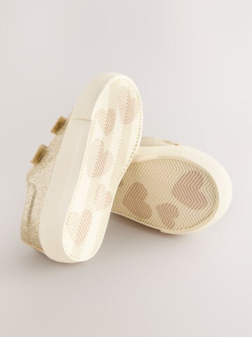 Baskets Next en or