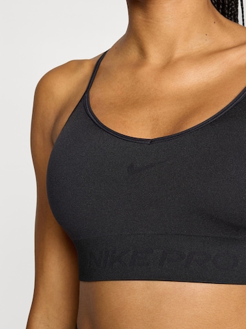 NIKE Бюстие Спортен сутиен в черно