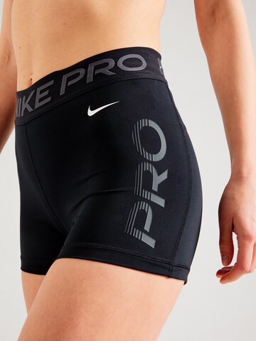 NIKE Skinny Sporthose in Schwarz