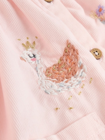 Set Next en rose