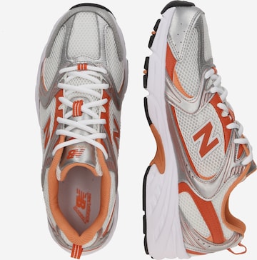 New balance 530 uomo arancione on sale