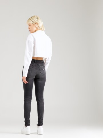 Tommy Jeans Skinny Jeans 'NORA MID RISE SKINNY' in Zwart