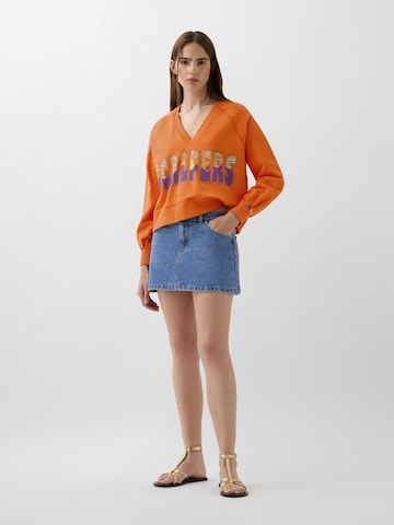 Sweat-shirt Scalpers en orange : devant