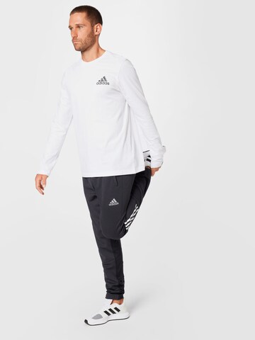 ADIDAS SPORTSWEAR - regular Pantalón deportivo en negro