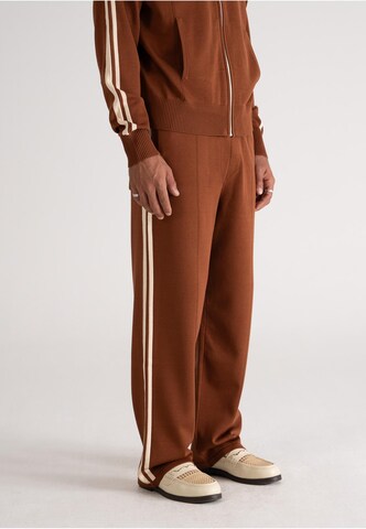 Prohibited Loose fit Pants in Brown: front