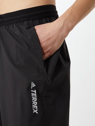 ADIDAS TERREX Ohlapna forma Outdoor hlače | črna barva