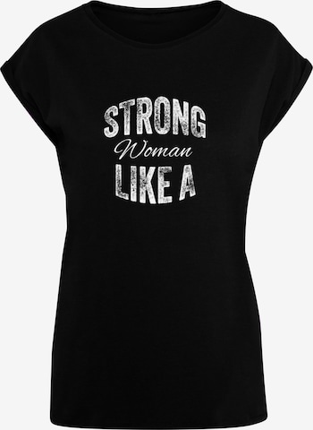 Merchcode Shirt 'WD - Strong Like A Woman' in Zwart: voorkant