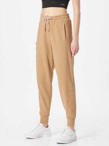 Tapered Pantaloni sport 'Infuse' de la PUMA pe bej: față