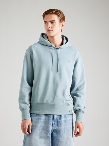 Calvin Klein JeansSweater majica - plava boja: prednji dio