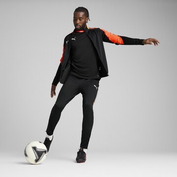 PUMA Trainingspak 'individualLiga' in Zwart