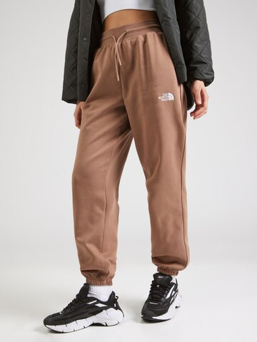 THE NORTH FACE - Tapered Pantalón 'ESSENTIAL' en marrón: frente