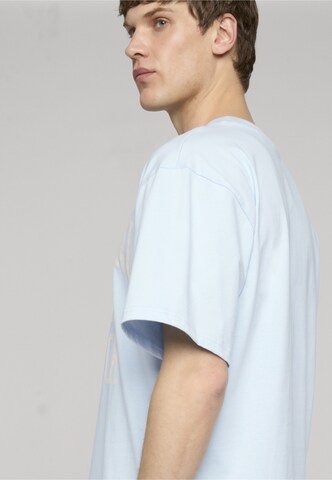 Karl Kani Tričko 'Heritage 89' – modrá