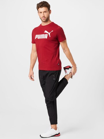 PUMA Loosefit Sportovní kalhoty 'First Mile' – černá