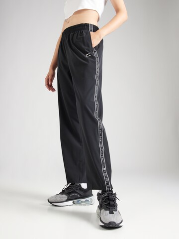 Loosefit Pantalon de sport NIKE en noir : devant