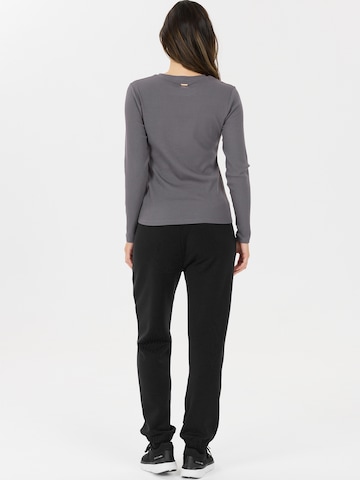 Athlecia Дънки Tapered Leg Спортен панталон 'Jillnana V2' в черно