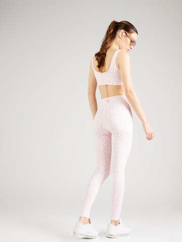 GUESS Skinny Sporthose 'LOGOMANIA' in Pink