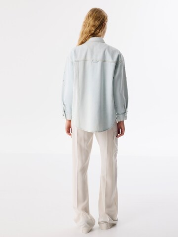 Veste mi-saison Twist en bleu